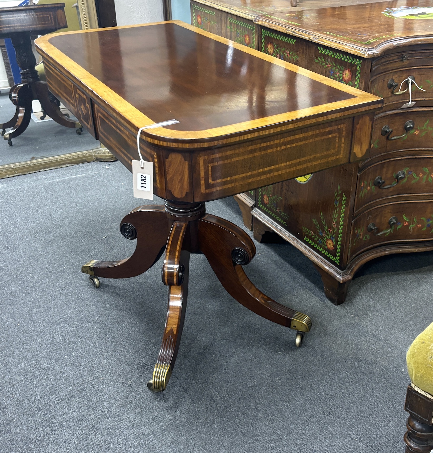 A Regency satinwood banded mahogany side table, adapted, width 90cm, depth 45cm, height 72cm.